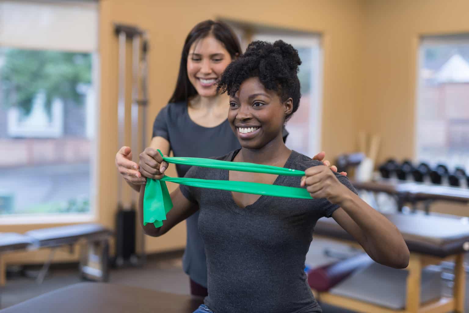 african american woman with pt tech, physical therapy orthopedics, ortho pt, orthopedic physical therapy exercises