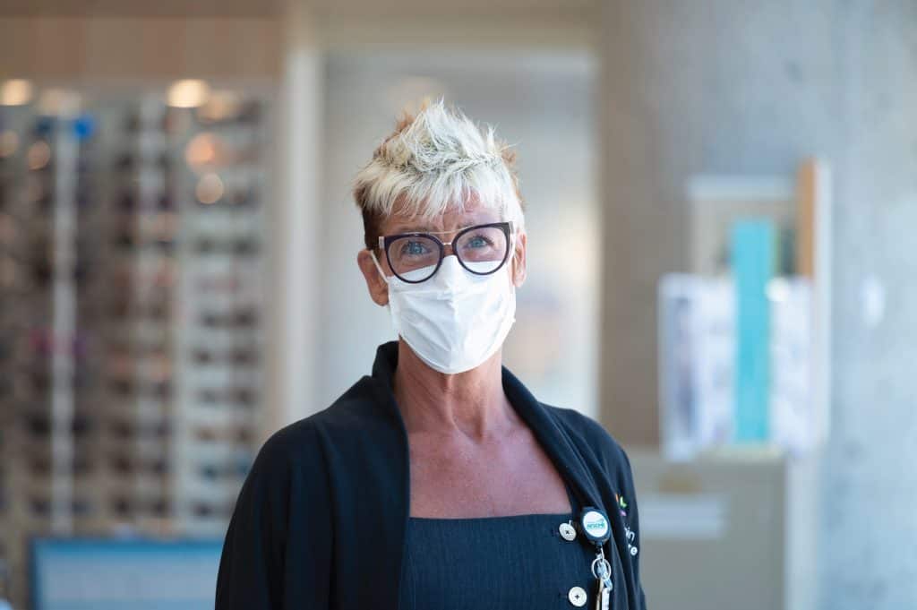 eye clinic optical shop nurse with mask