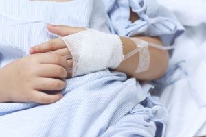 child with bandages and iv on hand who experienced what is frostbite at the hennepin county burn center where they treat scalds, skin graft for burns, skin grafting for burns, skin grafts for burns, skin flap surgery, burn reconstructive surgery