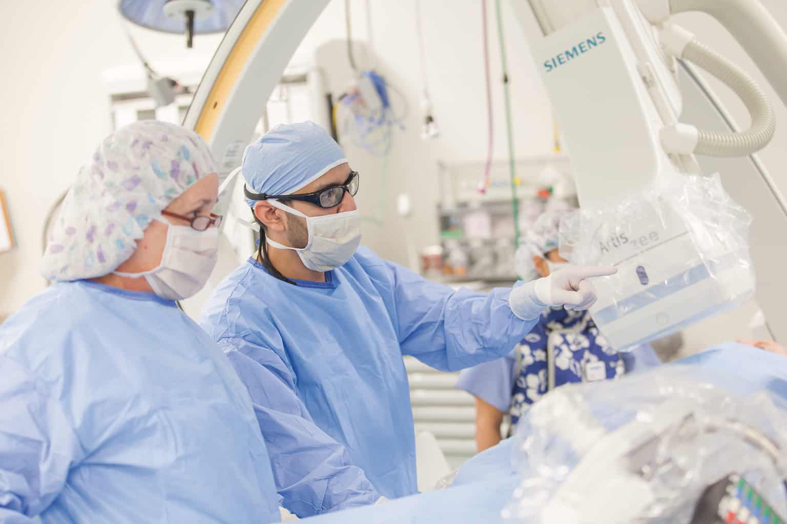 cath lab angiography catheterization laboratory doctors performing cath lab procedures