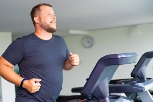 Man Exercising on Treadmill, frequently asked questions about weight loss surgery, post-operative planning, diets, exercise, weight loss recovery