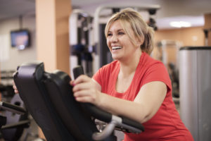 woman in fitness club, qualifying for surgery, nutrition information class, examination, dietitian, good candidate