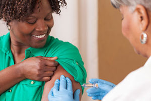 nurse giving a flu shot