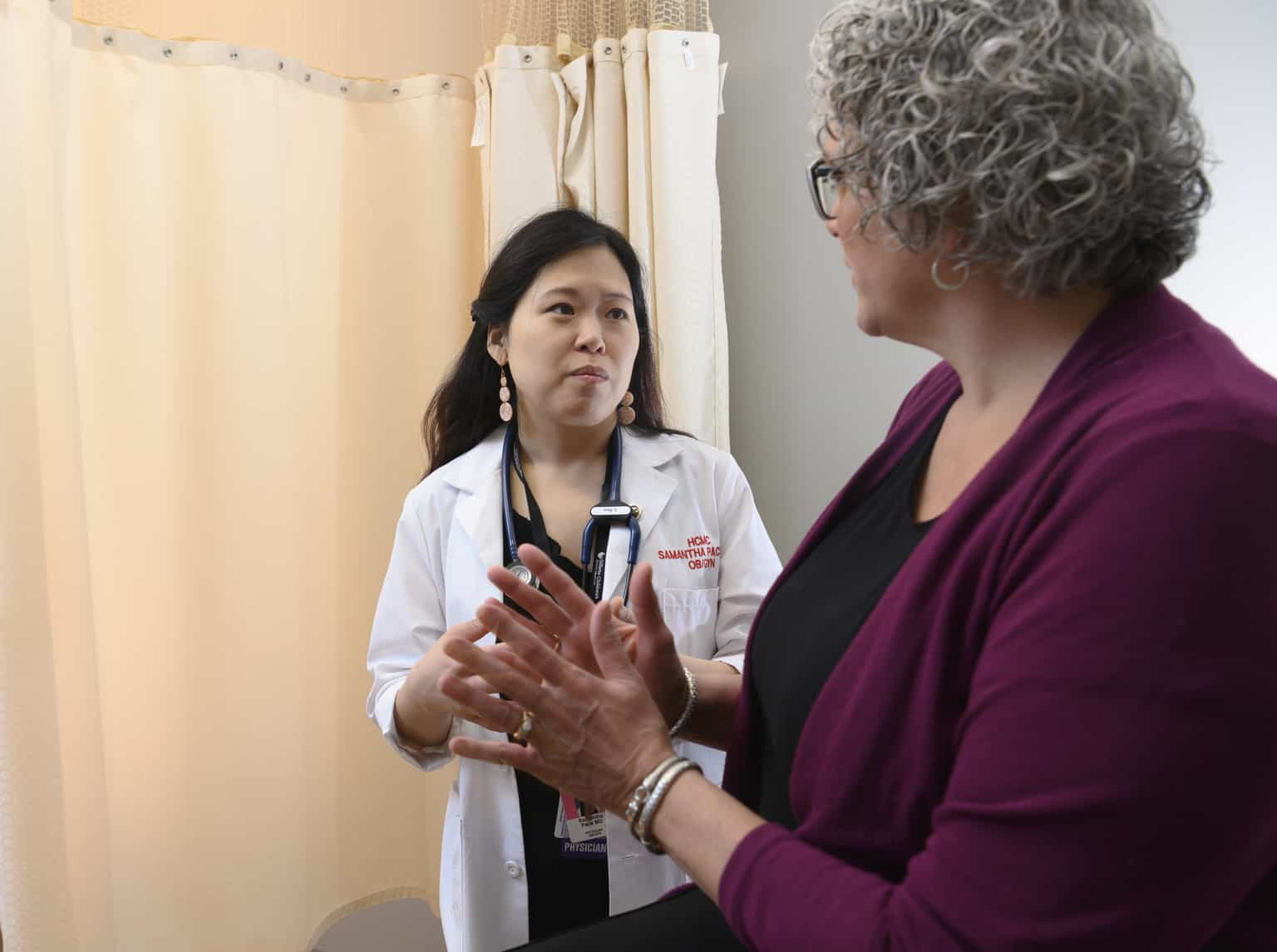 women's health doc with patient in clinic