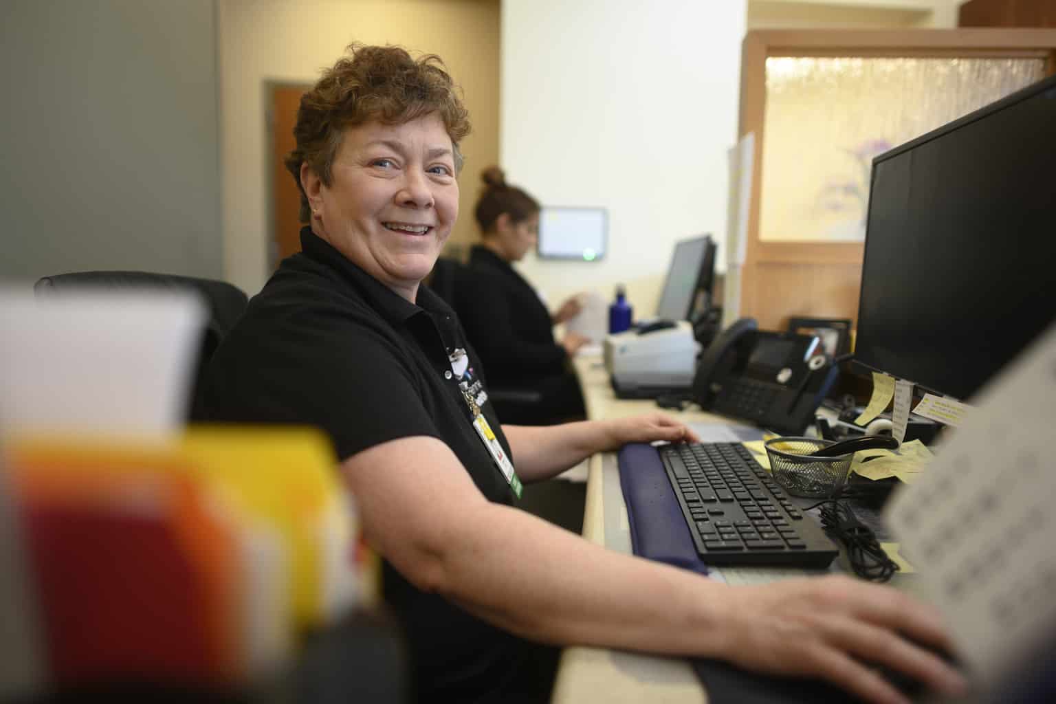 brooklyn park nurse at computer in clinic