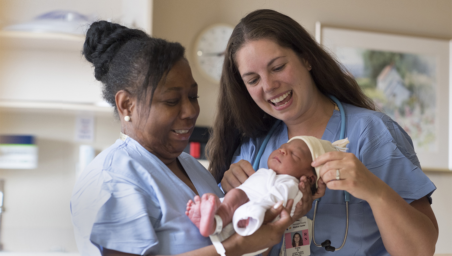 sicu nurses with newborn baby