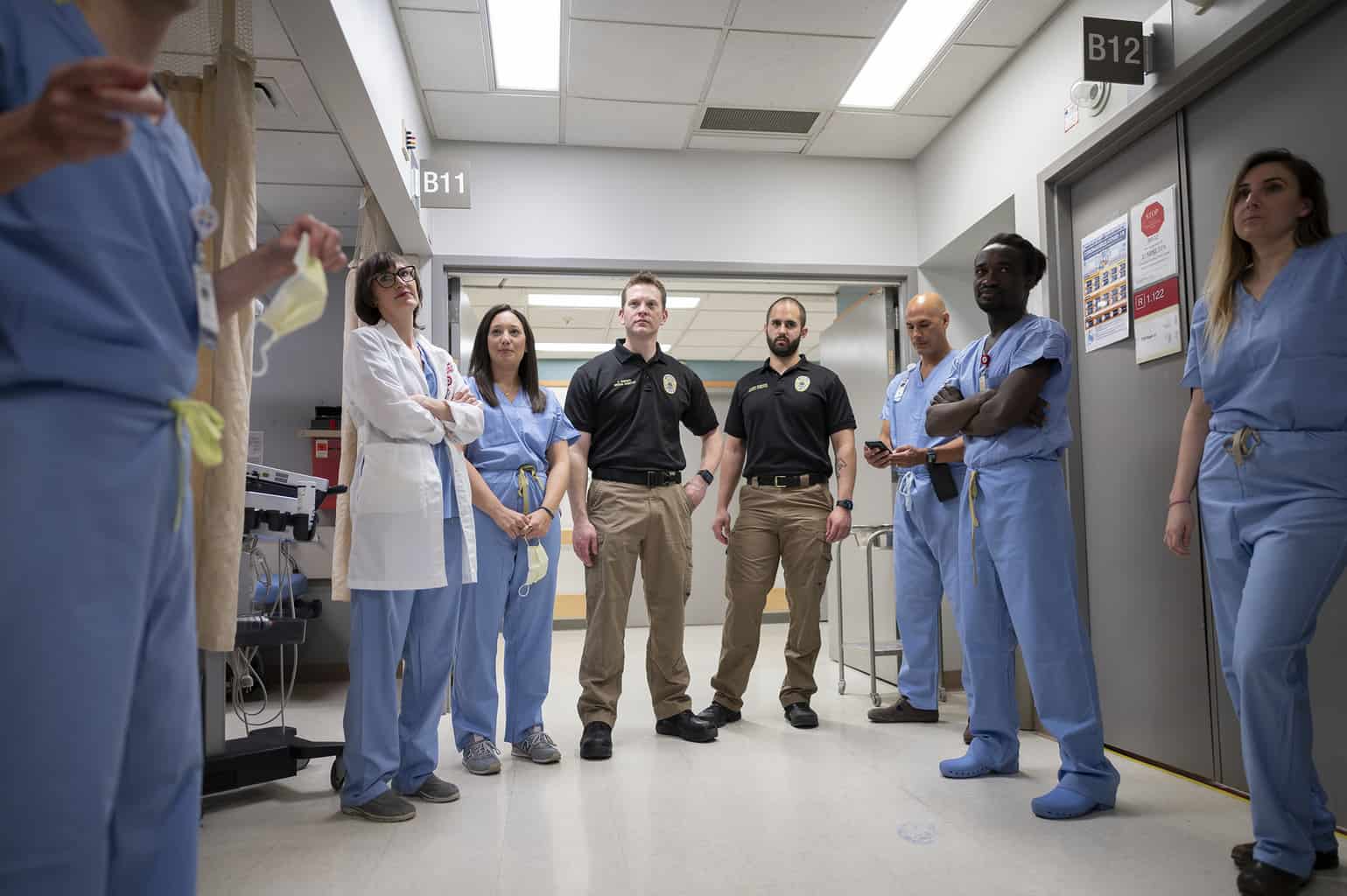emergency medicine staff team in hallway