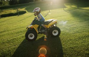 young child on atv, Dr. Stephen Smith, American Academy of Pediatrics, julie philbrook, Children injured in ATV accidents on the rise, too young to have a driver’s license, wearing helmets, accident prevention, injury prevention