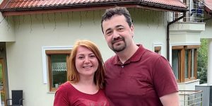 yan and lesia kravchenko in front of ukainian house, vital supplies, medical supplies, ukraine, refugees, humanitarian support