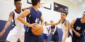 young boys playing basketball, sports physicals, sports physical, sports participation, healthy conversations, injury prevention, emerging health problems, pediatrician leslie king-schultz md