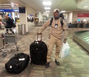 joe skinner at the airport standing with his suitcases, MN-1 DMAT, disaster response team, joe skinner, national disaster medical system, emergency response team