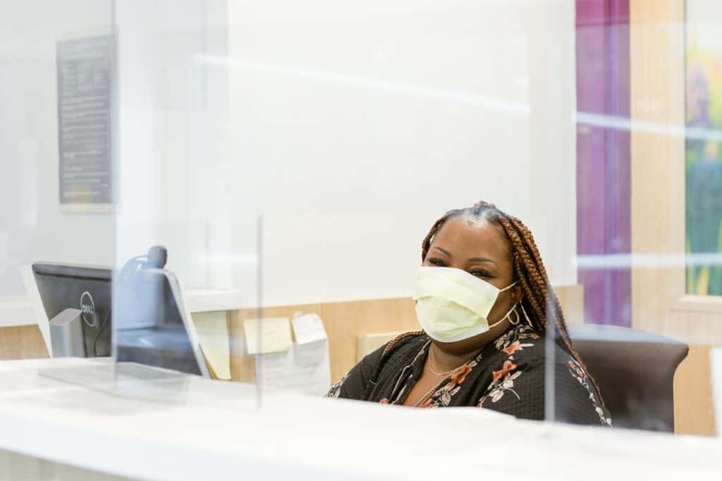 semora murrell, at teh welcome desk, voices of hennepin healthcare, semora murrell, we are the face of hennepin healthcare, working within a highly diverse community, different backgrounds