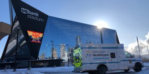 hennepin healthcare ambulance in front of us bank stadium, visitor from ny gets frostbite, hyperbaric treatment for frostbite, outpatient wound care, firefighters for healing