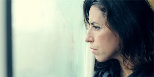 woman experiencing seasonal depression, seasonal affective disorder, sad, winter blues, depression during change of seasons, clinical form of depression, dr brian nelson
