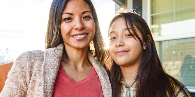 mother and daughter posing together outside, onset of puberty, guidance from parents, sense of identity, teen guidance, adolescents, teen relationships, parent-teen relationship, raising a teen, boundaries for a teen, guidance for a teen
