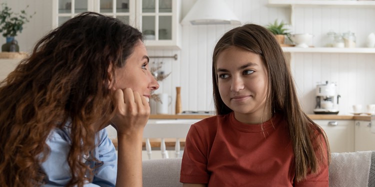 mother and teenage daughter talking at the dining table, talking to teens about the hard stuff, how to talk to teens, tips for talking to teens, supporting teens, raising teens, parent-teen relationship